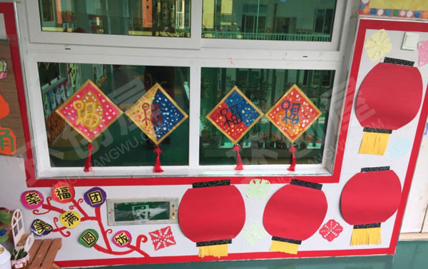 幼儿园走廊墙面新年到喜庆主题图片