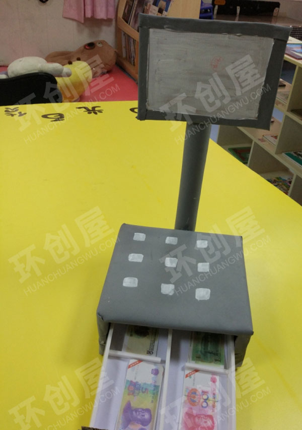 幼儿园角色娃娃家超市收银图片