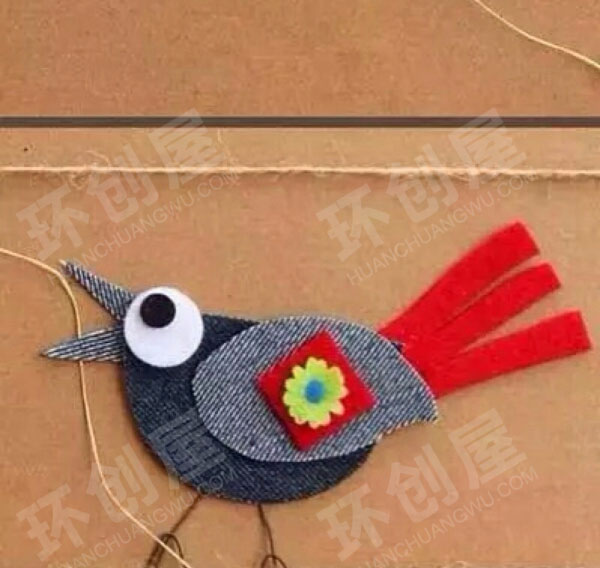 幼儿园废物利用布艺麻绳卡通画主题墙图片