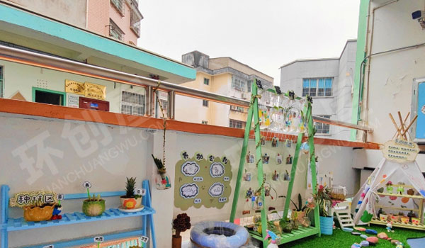 幼儿园户外环创寻找春天自然角图片