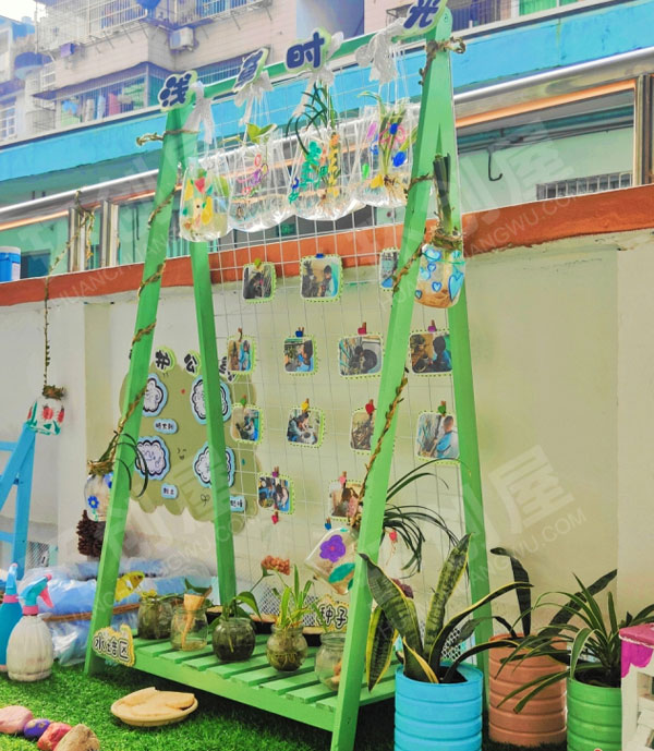幼儿园户外环创寻找春天自然角图片