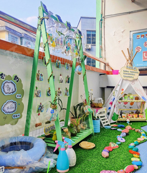 幼儿园户外环创寻找春天自然角图片