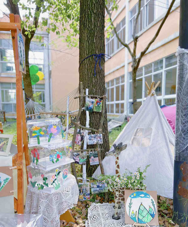幼儿园户外找春天花言草语图片