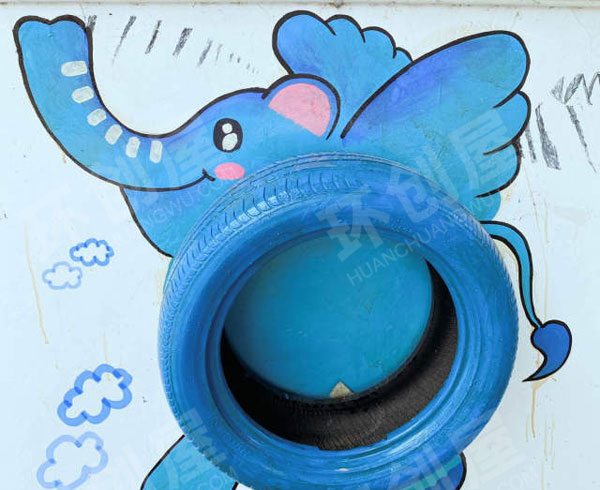 幼儿园户外环创动物风碰撞清新风轮胎跑上墙图片