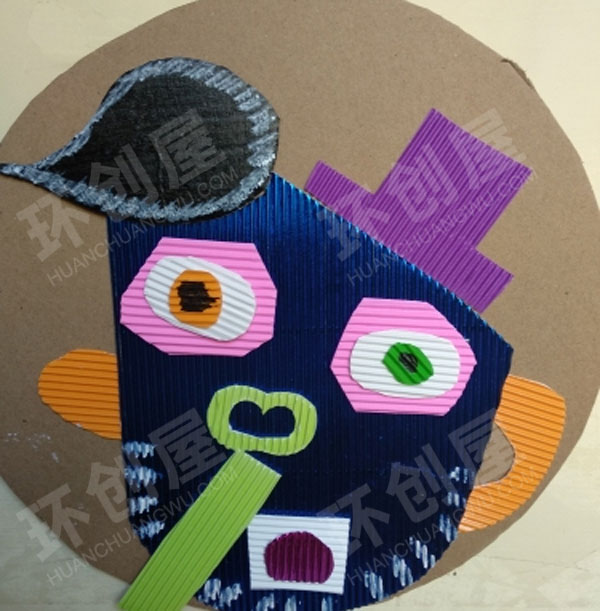幼儿园墙面布置纸板瓦楞纸人头作品图片