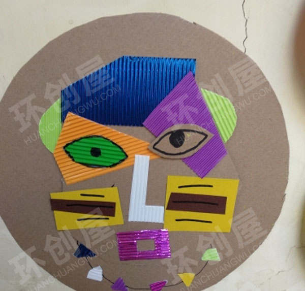 幼儿园墙面布置纸板瓦楞纸人头作品图片