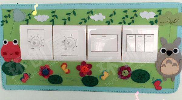 幼儿园不织布手工卡通动物开关贴墙面布置图片