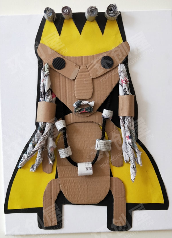 幼儿园硬纸板纸皮人头手工立体抽象作品展示图片
