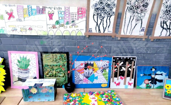 幼儿园艺术节废物利用作品展示户外环创图片