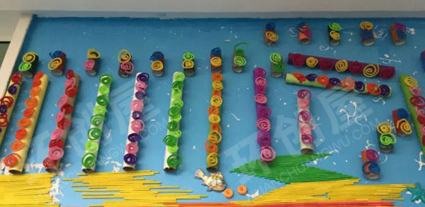 幼儿园废物利用触摸墙面布置图片