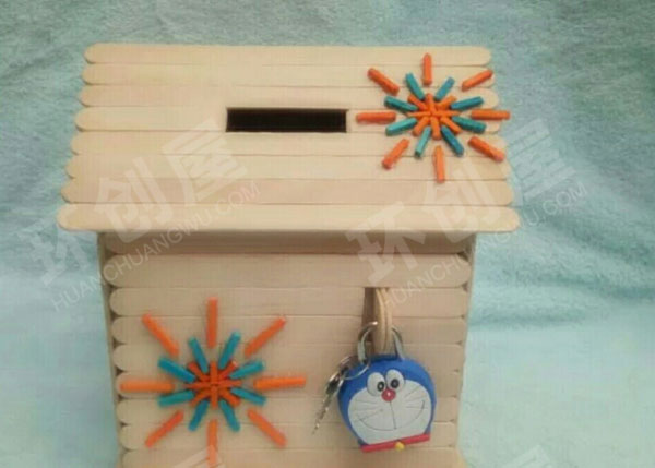 幼儿园废物利用雪糕棒组成的作品展示图片