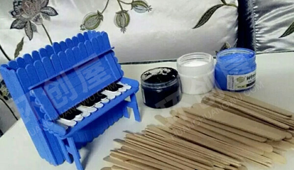 幼儿园废物利用雪糕棒组成的作品展示图片