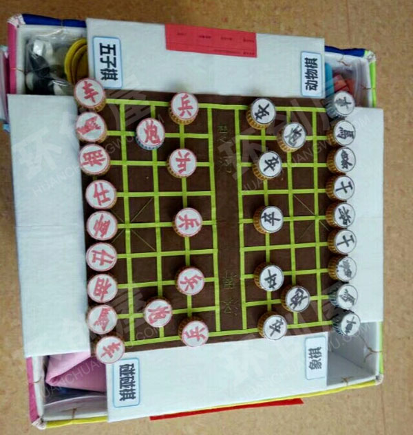 幼儿园益智区废旧利用魔法瓶盖自制玩教具图片