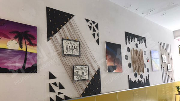 幼儿园楼道墙面布置木棍线绳作品图片