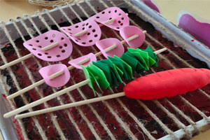 幼儿园角色游戏废物利用烧烤区图片8张