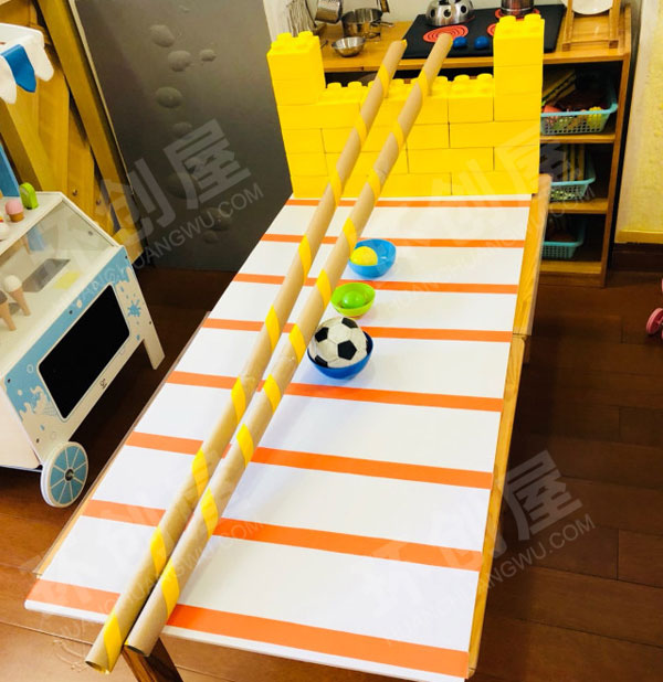 幼儿园益智区自制玩教具棍夹球图片