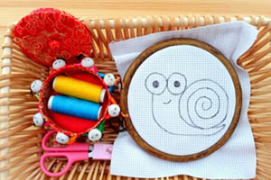 幼儿园益智区十字绣小蜗牛图片