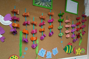 幼儿园走廊卡纸手工自然四季墙面装饰图片5张