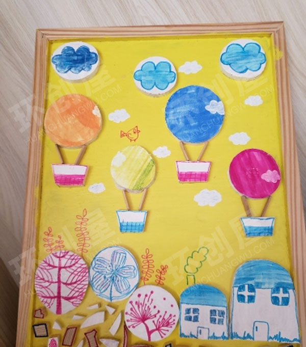 幼儿园圆木片拼贴制作木片画作品展示图片