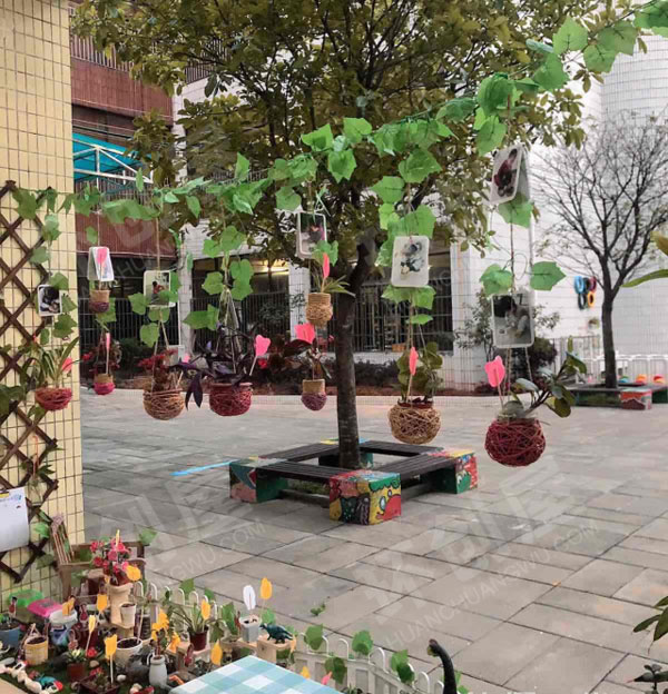 幼儿园植物角恐龙花园户外环创图片