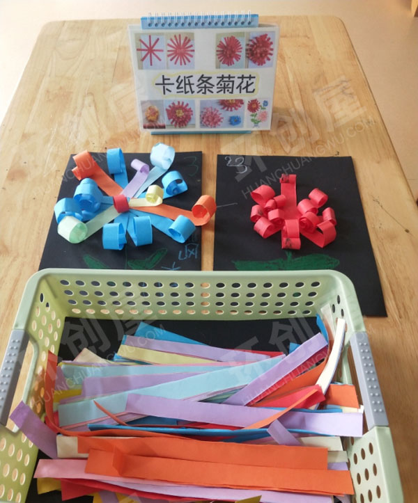 幼儿园美工区卡纸条菊花图片