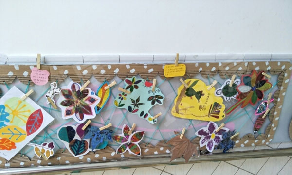 幼儿园废物利用纸箱楼梯走廊墙面环创图片