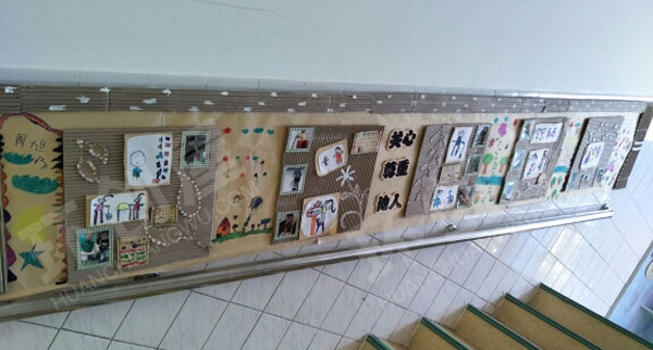 幼儿园废物利用纸箱楼梯走廊墙面环创图片