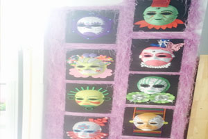 幼儿园走廊墙面面具装饰环创图片