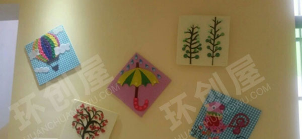 幼儿园废物利用扣子联盟走廊墙面环创图片