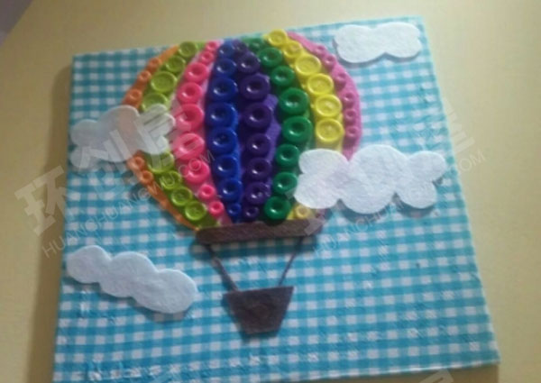 幼儿园废物利用扣子联盟走廊墙面环创图片