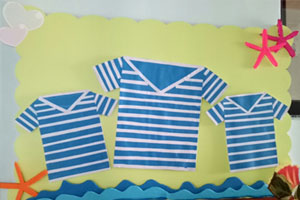 幼儿园海洋风衣服家园联系栏环创图片