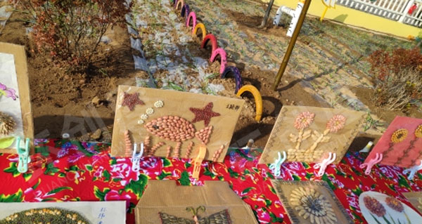 幼儿园户外环创种子粘贴画作品展示图片