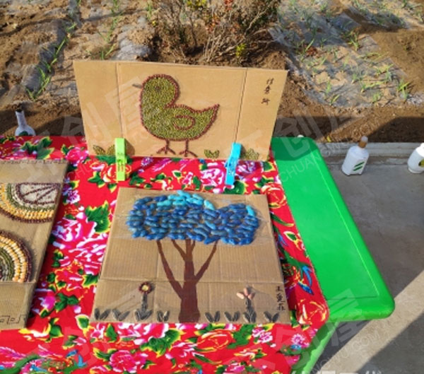 幼儿园户外环创种子粘贴画作品展示图片