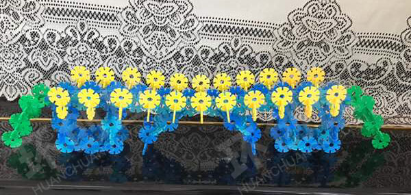 幼儿园建构区雪花片拼接桥环创图片