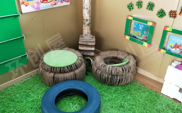 幼儿园废物利用轮胎布置阅读区图片