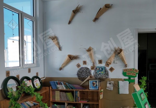 幼儿园废物利用轮胎布置阅读区图片