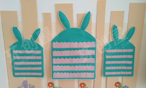 幼儿园墙面布置不织布自制卡袋环创图片