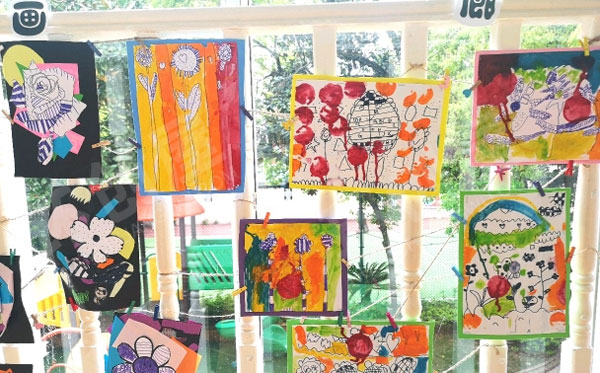 幼儿园春天的花创意手工画窗户围栏环创图片