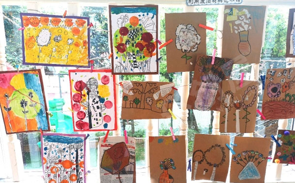 幼儿园春天的花创意手工画窗户围栏环创图片