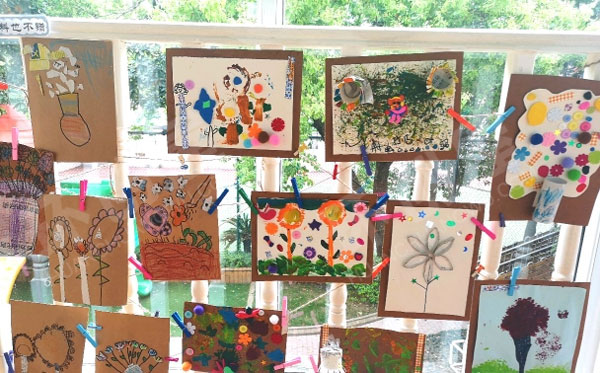 幼儿园春天的花创意手工画窗户围栏环创图片