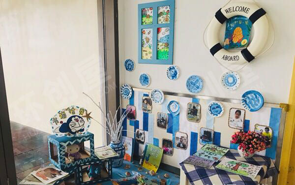 幼儿园阅读区角落里的故事书海拾贝环创图片