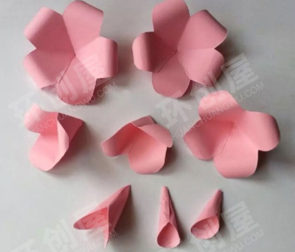 幼儿园美工区卡纸手工折纸剪裁美丽的花儿图片