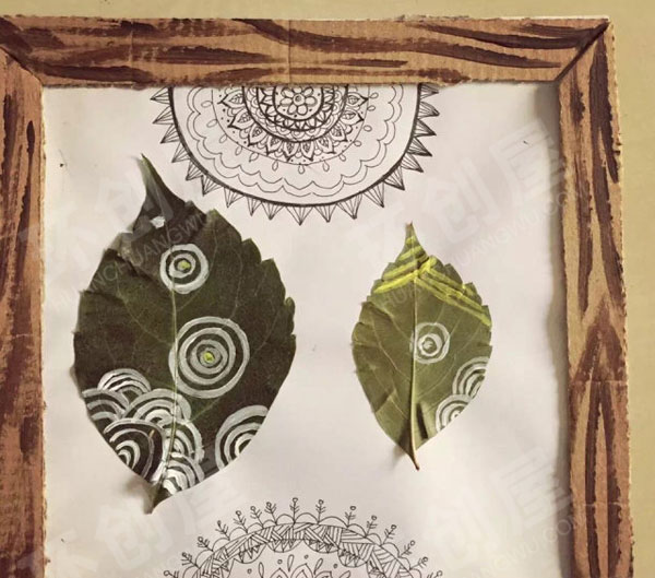 幼儿园自制手作树叶贴画手绘墙面布置环创图片