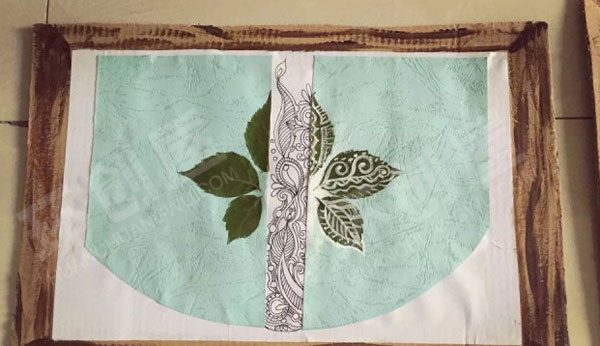 幼儿园自制手作树叶贴画手绘墙面布置环创图片