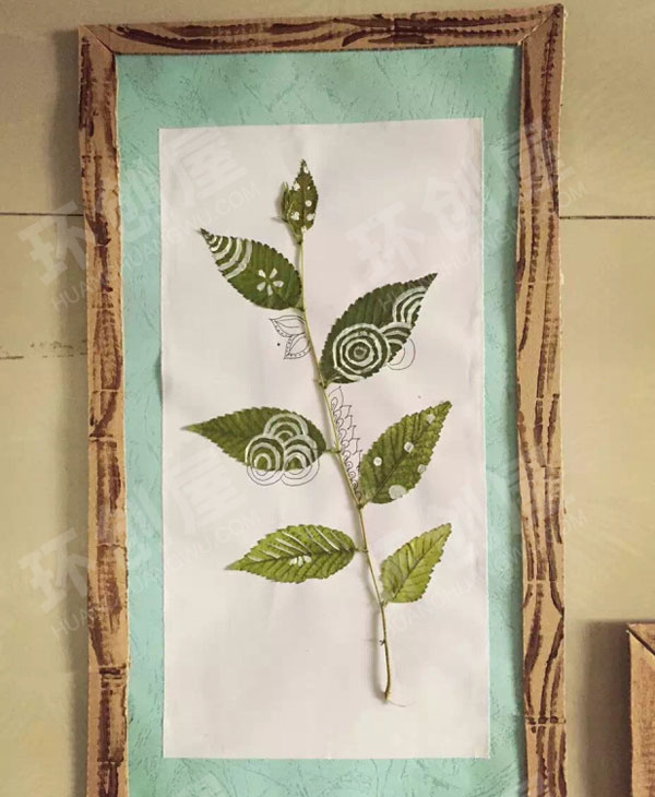 幼儿园自制手作树叶贴画手绘墙面布置环创图片