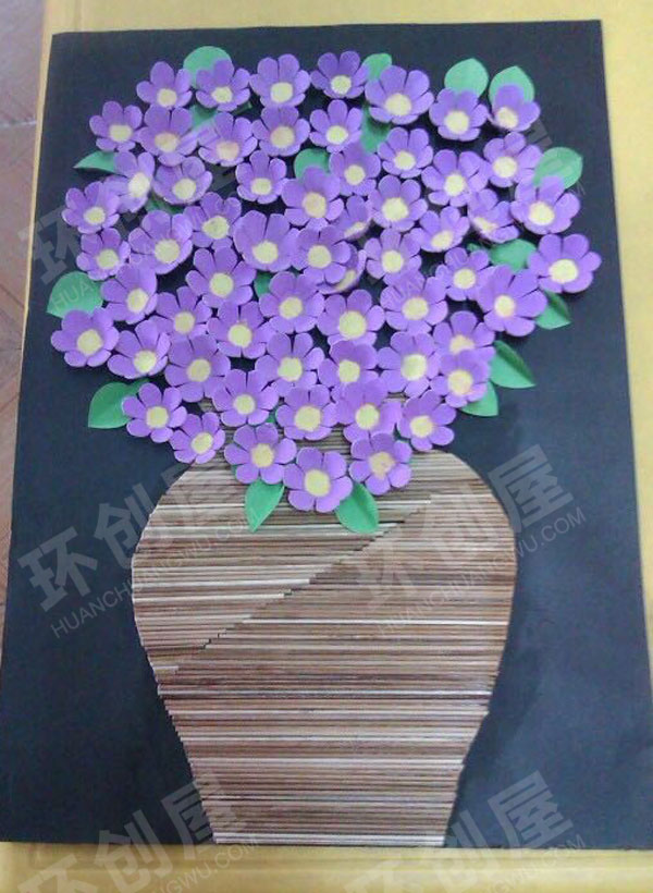 幼儿园墙面布置鸡蛋托紫花花瓶环创图片