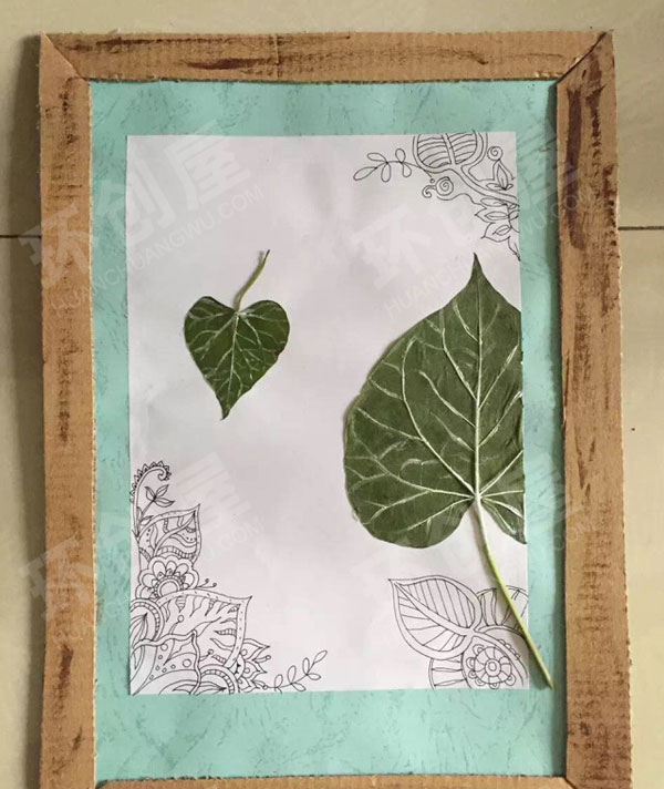 幼儿园自制手作树叶贴画手绘墙面布置环创图片