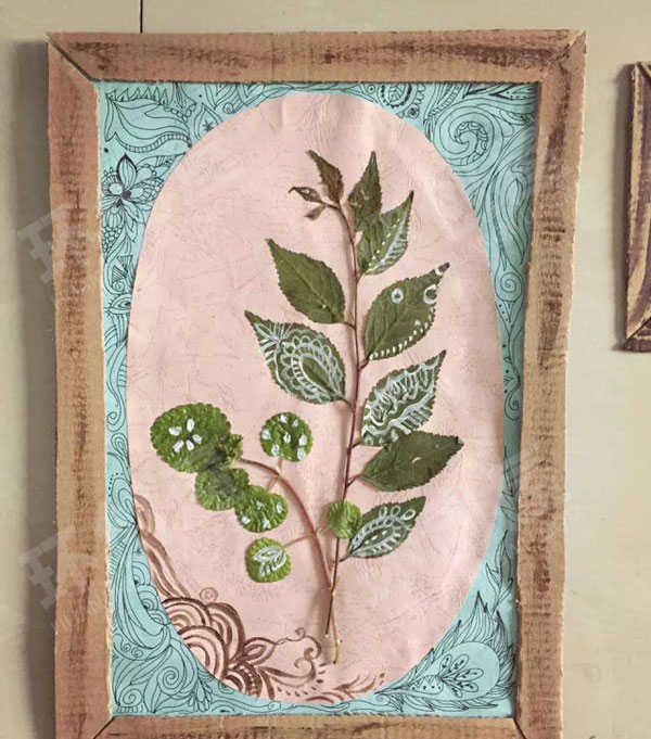 幼儿园自制手作树叶贴画手绘墙面布置环创图片