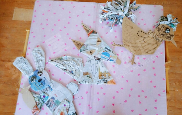 幼儿园走廊墙面报纸碎片创意动物环创图片