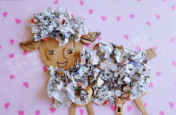 幼儿园走廊墙面报纸碎片创意动物环创图片